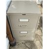 Image 1 : 2 Door Filing Cabinet. With files inside. Drawers Work Well.