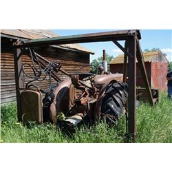 Super 6 IH Tractor c/w farmhand & rear tire chains.  Motor is not seized but not running.   Serial #