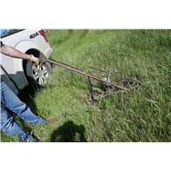 Old garden push seeder