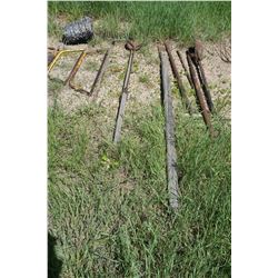 Hand post hole digger, bars, hole cleaner, 2 - buck saws, part roll of barbed wire & hand saw
