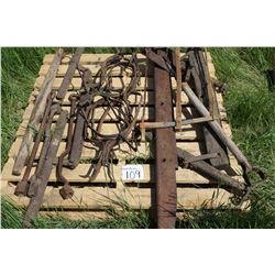 horse eveners, neck yoke, cow fence stays & old saw