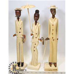 SET OF 3 CARVED WOOD PEOPLE 2006