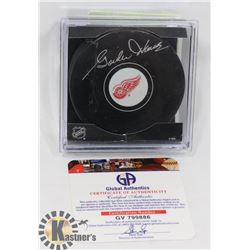GORDIE HOWE PUCK SIGNED PUCK WITH COA FROM GLOBAL
