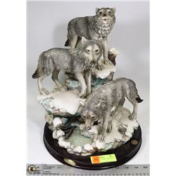 THREE WOLF CERAMIC ORNAMENT NAMED THE CANADIAN