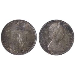 1967 $1 PCGS Gem Mint State-65.  Gem lustrous fields under pink and gold tones.