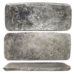 Silver "tumbaga" bar #M-134, 14.63 lb av, marked with fineness IUBLXXV (1575/2400), plus serial numb