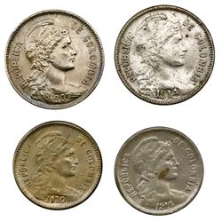 Lot of four Colombia, copper-nickel papel moneda coins: 2 pesos, 1907 and 1914; 1 peso, 1910 and 191