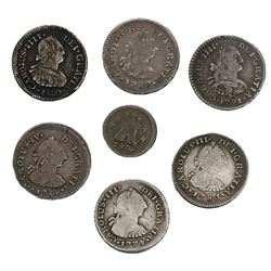 Lot of seven Spanish colonial (various mints) bust 1/2R (six) and 1/4R (one), as follows: Santiago,