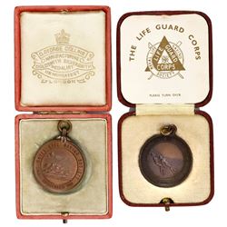 Lot of two Great Britain Royal Life Saving Society bronze medals in original presentation boxes, eng