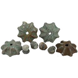 Lot of four bronze church-door ornaments (with knobs), one partially cleaned, ex-Consolacion (1681).