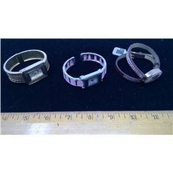 3 ASSORTED WATCHES - GOLD, BREAST CANCER AWARENESS, AND WRAP-AROUND