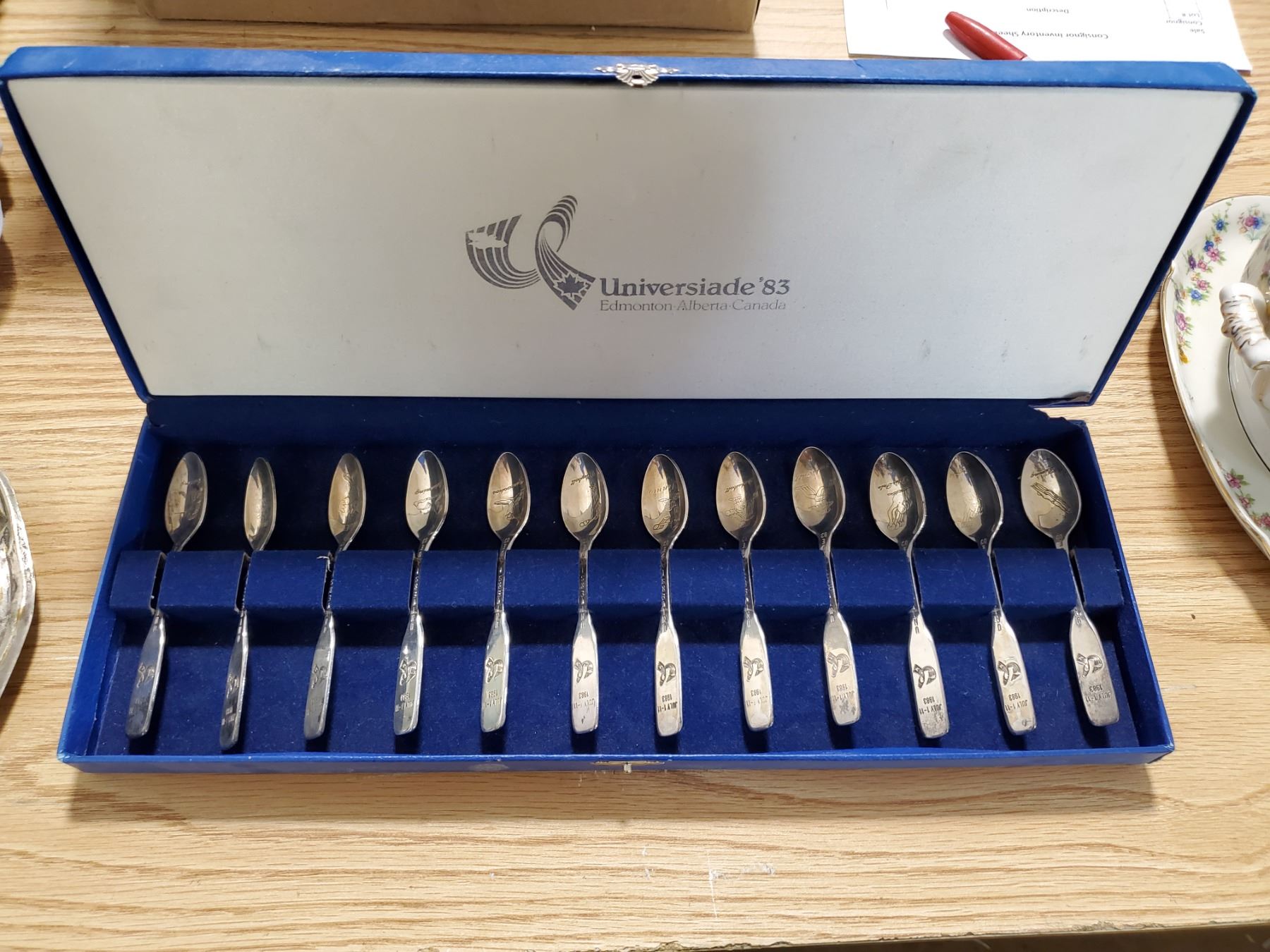 12 COLLECTOR SPOONS