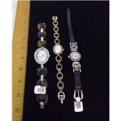 2 SMALL WATCHES AND ONE LARGE WATCH