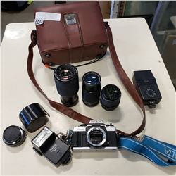 MINOLTA XGM CAMERA W/ 4 LENSES AND ACCESSORIES