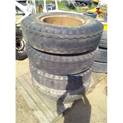 SET OF 4 TIRES - 10.00-20 W/ RIMS
