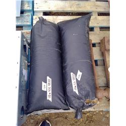 2 Bags of Sand - One is Open