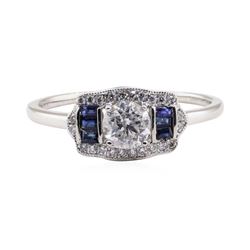 0.64 ctw Diamond and Sapphire Ring - Platinum