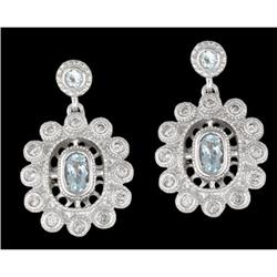 14KW Gold Dangling Diamond Blue Topaz Earrings