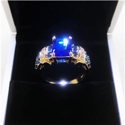 Ladies 6K Tanzanite Stone Ring, Mounted On Gold Tone Band With Inset Semi-Precious Stones