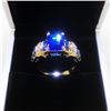 Image 1 : Ladies 6K Tanzanite Stone Ring, Mounted On Gold Tone Band With Inset Semi-Precious Stones