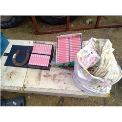 CASSETTES, HORSESHOE, AND FLOWER SHEET