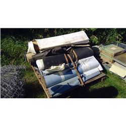 LARGE PALLET WITH SEVERAL ROLLS OF ROOFING MATERIAL