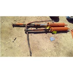 TWO ORANGE TRACTOR HYDROLIC SPRINGS