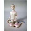 Image 1 : A CYBIS FIGURINE OF A SITTING GIRL HOLD