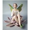 Image 1 : A GOEBEL FIGURINE OF A WINGED GIRL ON A