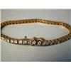 Image 2 : A 14K YELLOW GOLD TENNIS STYLE BRACELET