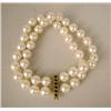 Image 1 : A DOUBLE STRAND PEARL BRACELET WITH A Y