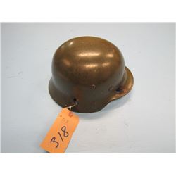 original World War II Nazi steel helmet bullet holes through front and side marked Hptm Witzel