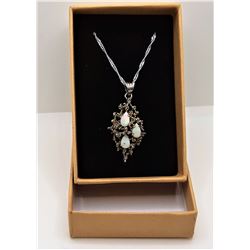 3)  SILVER AND GOLD TONE PENDANT SET WITH