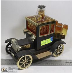 1960'S MUSICAL CAR DECANTER WITH SHOT GLASSES