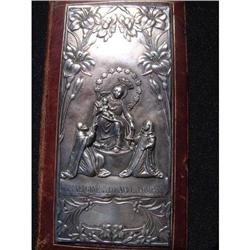 Antique religious book bound in leather and #947943