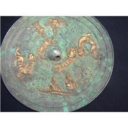 Antique Chinese gilded mirror dating to Tang #947961