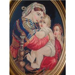 Framed antique needlework representing Mary #947978