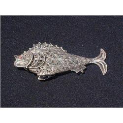 Filigree silver spice container in shape of a #947983