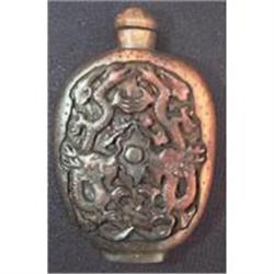 Old wood snuff bottle decorated with dragons #948134