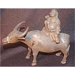 Japanese bronze sculpture of Lao Tze riding #948169