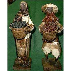Papier-Mache Woman and Man #993459