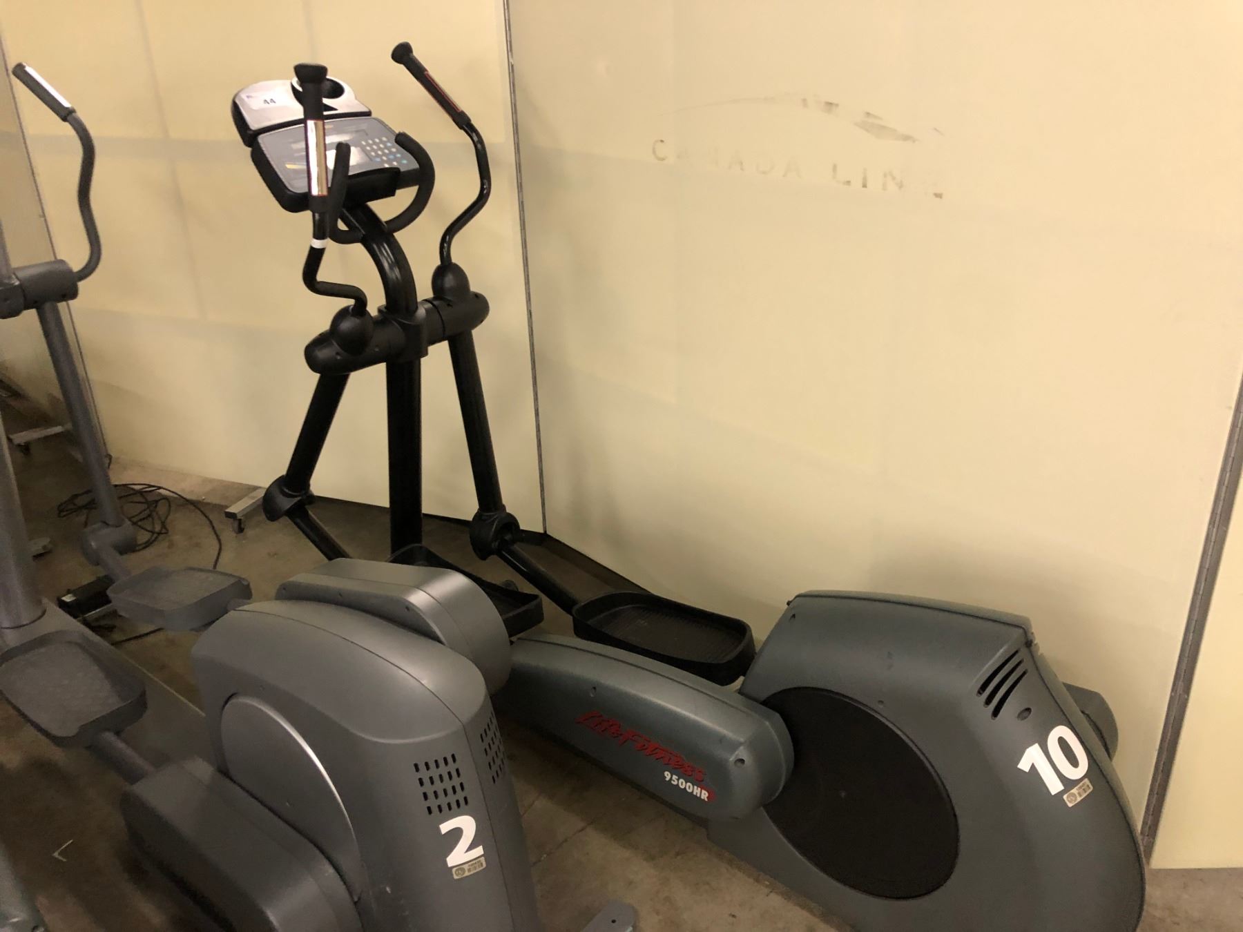 LIFE FITNESS 9500HR ELLIPTICAL MACHINE WITH STAND - Able Auctions