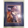 Image 1 : HANK WILLIAMS JR. SIGNED AND PROFESSIONALLY FRAMED PHOTOGRAPH WITH CERTIFICATE OF AUTHENTICITY.