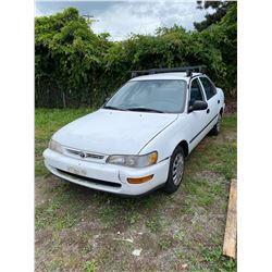 1997 TOYOTA COROLLA, 4DRSD, WHITE, GAS, AUTOMATIC, VIN#2T1BA01E4VC212378, 129,447KMS, RD,CR, ROOF