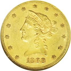 	1868 $10 AU55 NGC. Pleasing orange and greenish-gold s 1868