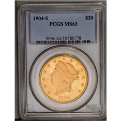 	1904-S $20 MS63 PCGS. The frosty orange-gold faces rev 1904-S