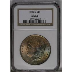 	1885-O S$1 MS66 NGC. Rich tan, aquamarine, and rose ad 1885-O