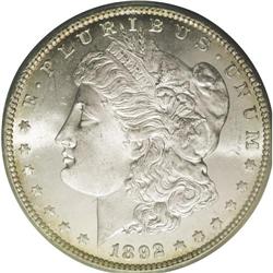 	1892-CC S$1 MS65 PCGS. The 2 in the date has a die chi 1892-CC