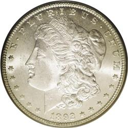 	1892-CC S$1 MS65 PCGS. A highly lustrous example that 1892-CC