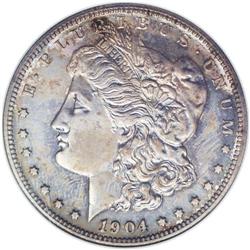 	1904 S$1 PR65 NGC. Moderately toned on each side in sh 1904